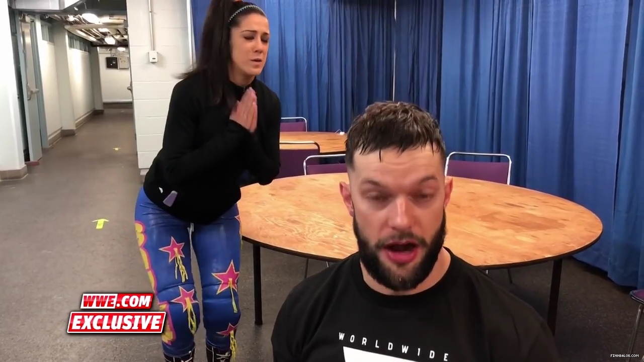 Bayley_strives_to_get_Finn_Balor_s_attention_en_route_to_Mixed_Match_Challenge__mp40026.jpg