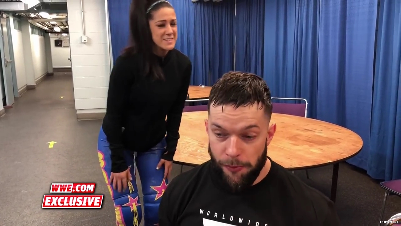 Bayley_strives_to_get_Finn_Balor_s_attention_en_route_to_Mixed_Match_Challenge__mp40028.jpg