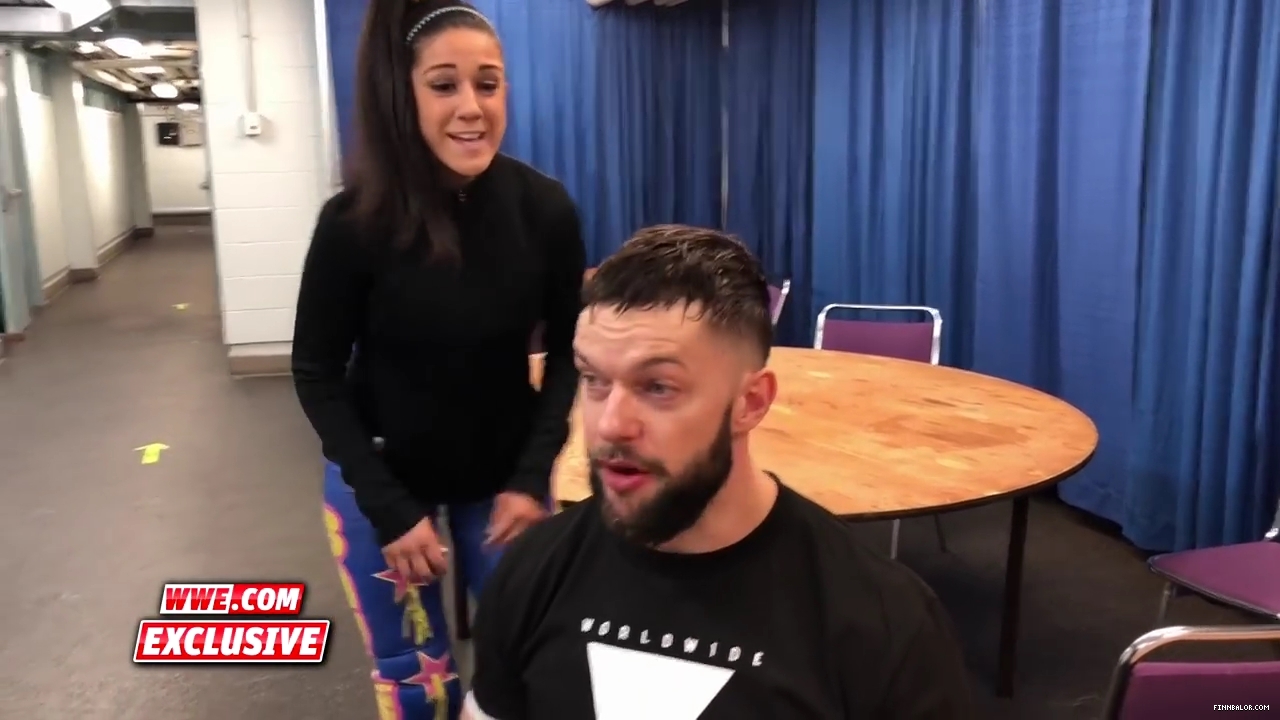 Bayley_strives_to_get_Finn_Balor_s_attention_en_route_to_Mixed_Match_Challenge__mp40030.jpg