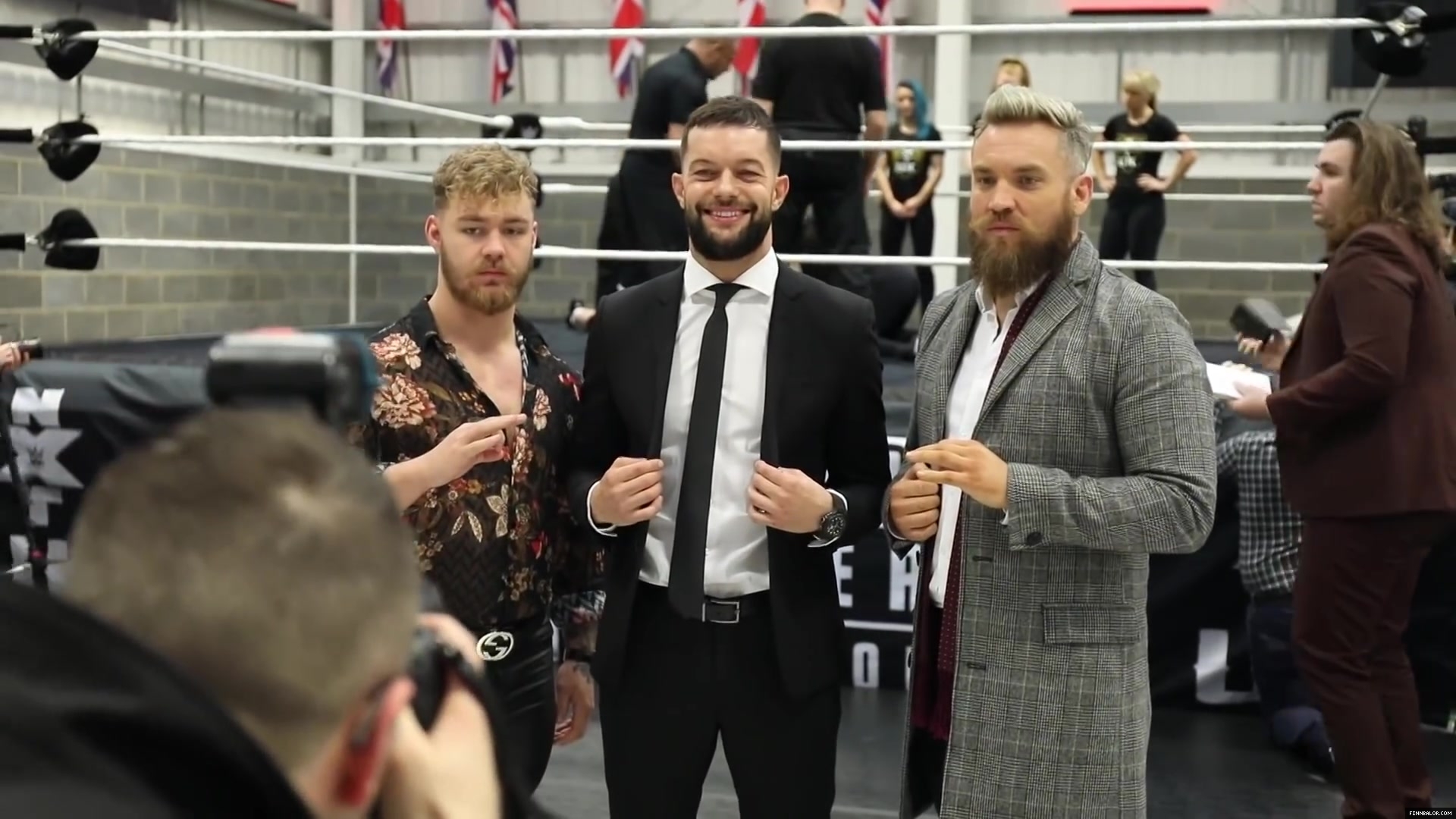WWE_Superstar_FINN_BALOR_joins_MOUSTACHE_MOUNTAIN_at_the_opening_of_the_NXT_UK_PC_039.jpg