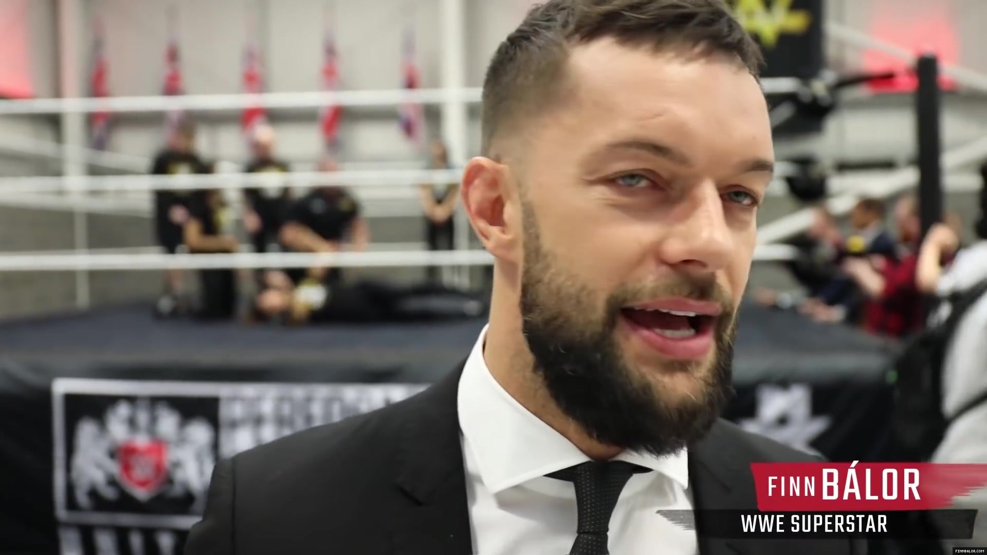 WWE_Superstar_FINN_BALOR_joins_MOUSTACHE_MOUNTAIN_at_the_opening_of_the_NXT_UK_PC_054.jpg