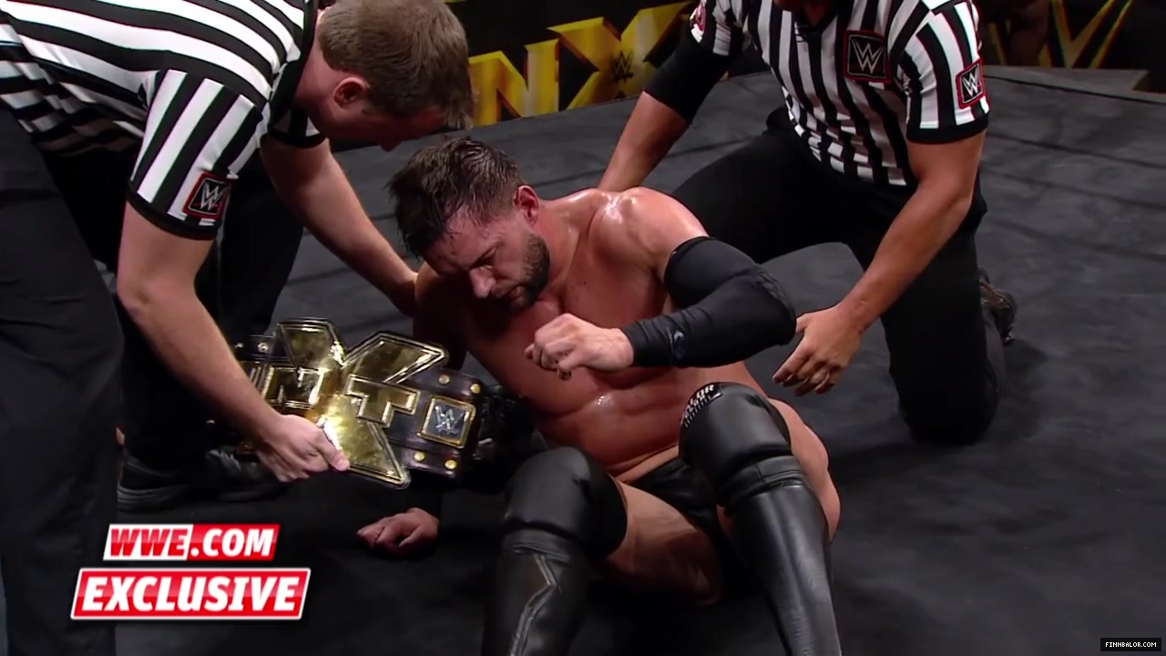 Finn_B_lor_and_Apollo_Crews_are_helped_backstage-_WWE_com_Exclusive2C_Nov__42C_2015_021.jpg