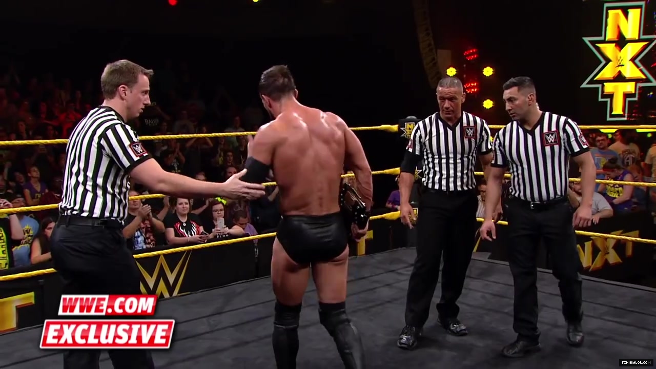 Finn_B_lor_and_Apollo_Crews_are_helped_backstage-_WWE_com_Exclusive2C_Nov__42C_2015_054.jpg