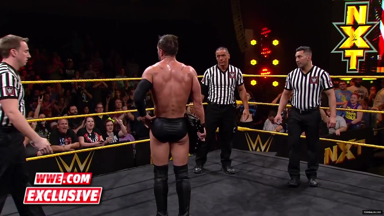 Finn_B_lor_and_Apollo_Crews_are_helped_backstage-_WWE_com_Exclusive2C_Nov__42C_2015_056.jpg