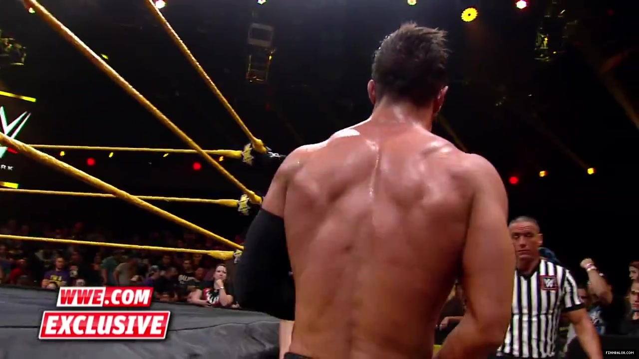 Finn_B_lor_and_Apollo_Crews_are_helped_backstage-_WWE_com_Exclusive2C_Nov__42C_2015_082.jpg