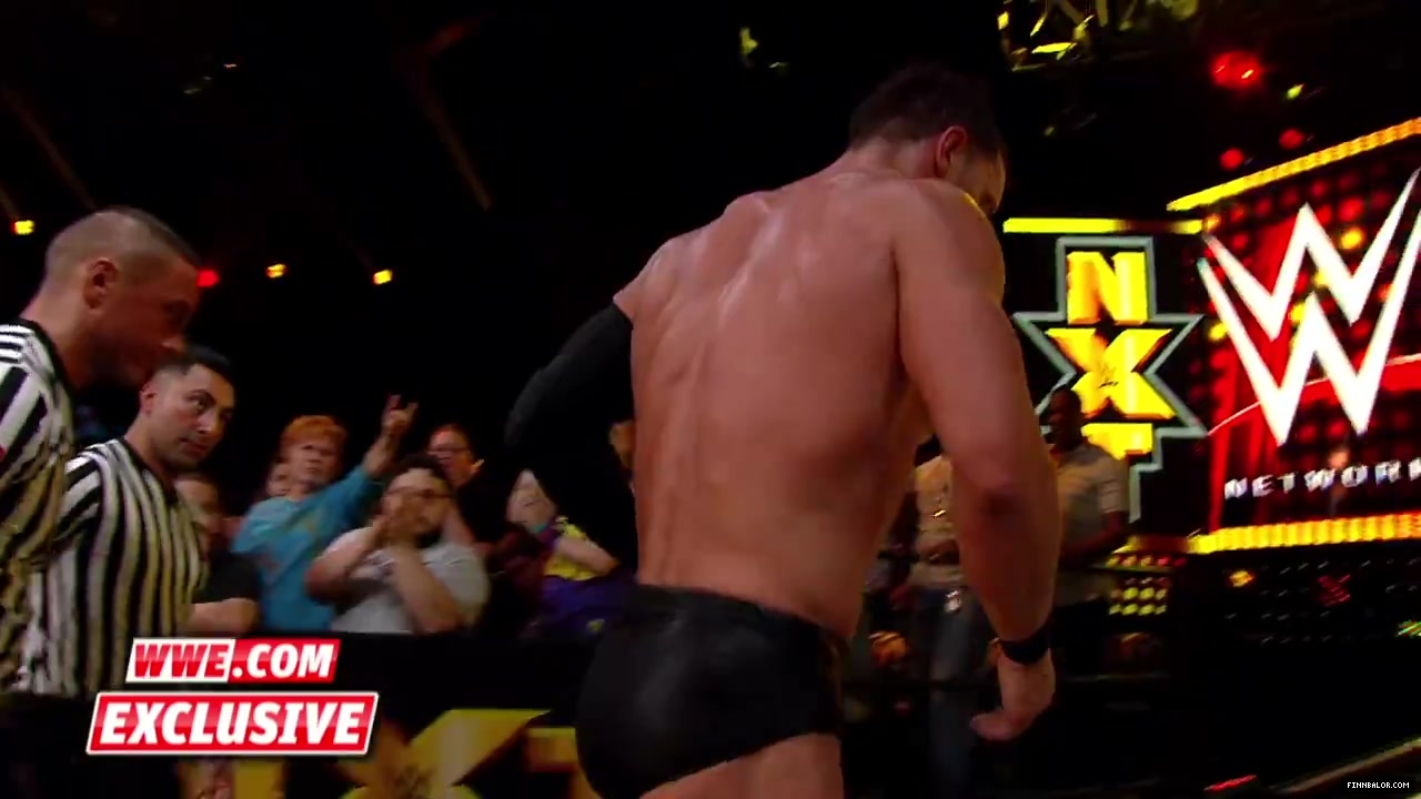 Finn_B_lor_and_Apollo_Crews_are_helped_backstage-_WWE_com_Exclusive2C_Nov__42C_2015_085.jpg