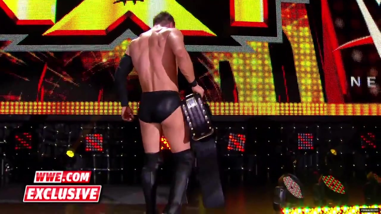 Finn_B_lor_and_Apollo_Crews_are_helped_backstage-_WWE_com_Exclusive2C_Nov__42C_2015_096.jpg