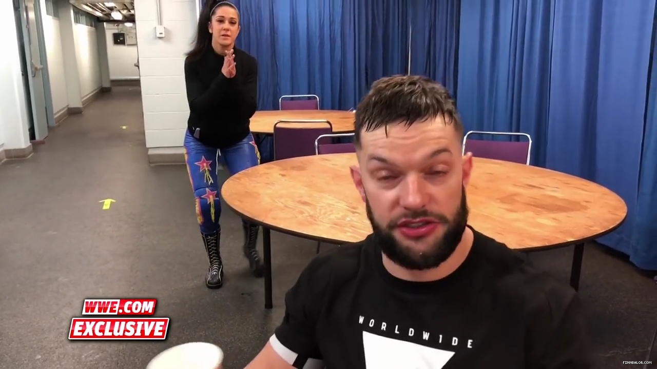 Bayley_strives_to_get_Finn_Balor_s_attention_en_route_to_Mixed_Match_Challenge__mp40022.jpg
