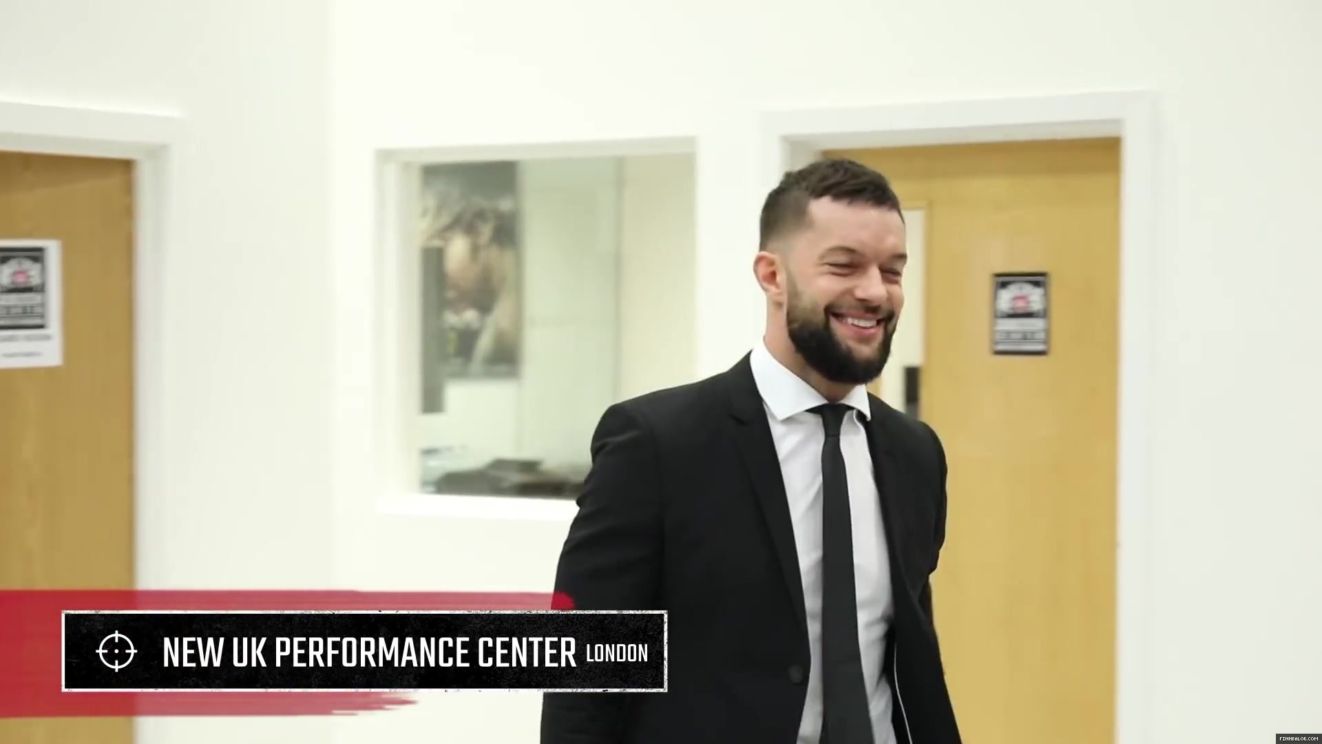 WWE_Superstar_FINN_BALOR_joins_MOUSTACHE_MOUNTAIN_at_the_opening_of_the_NXT_UK_PC_014.jpg