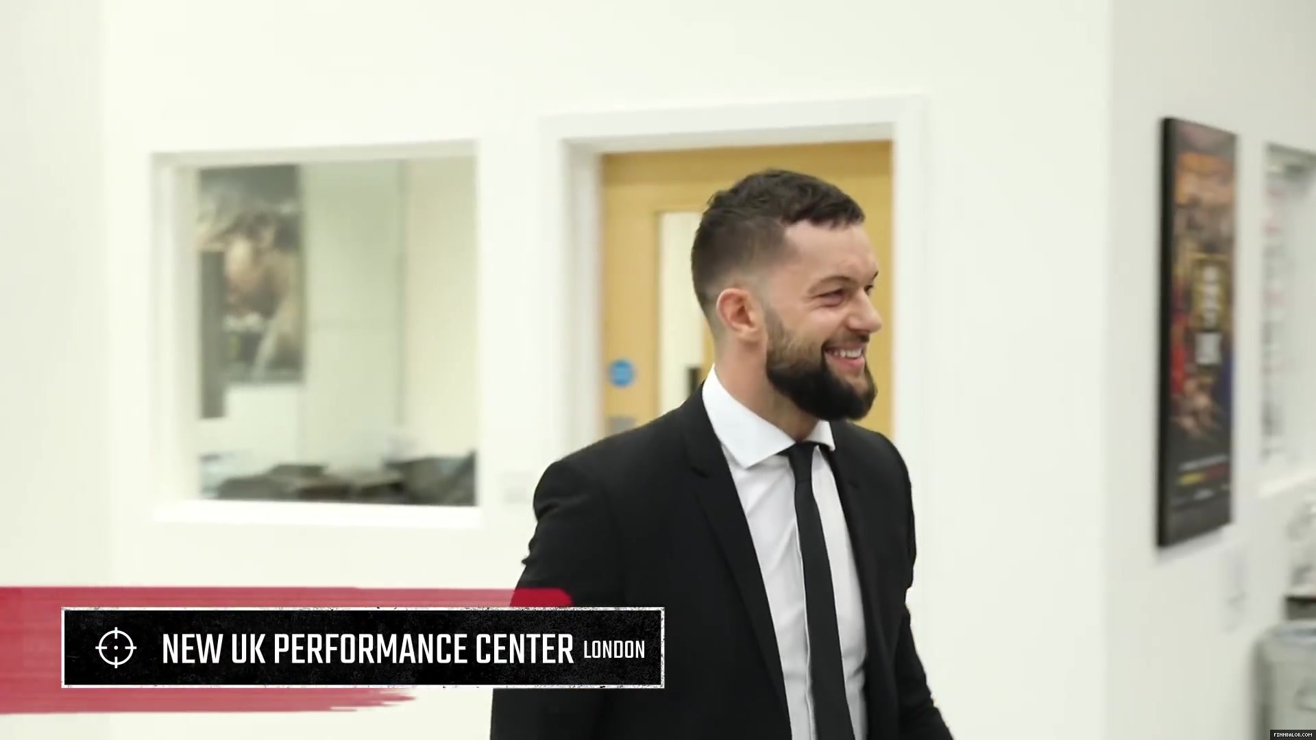 WWE_Superstar_FINN_BALOR_joins_MOUSTACHE_MOUNTAIN_at_the_opening_of_the_NXT_UK_PC_015.jpg