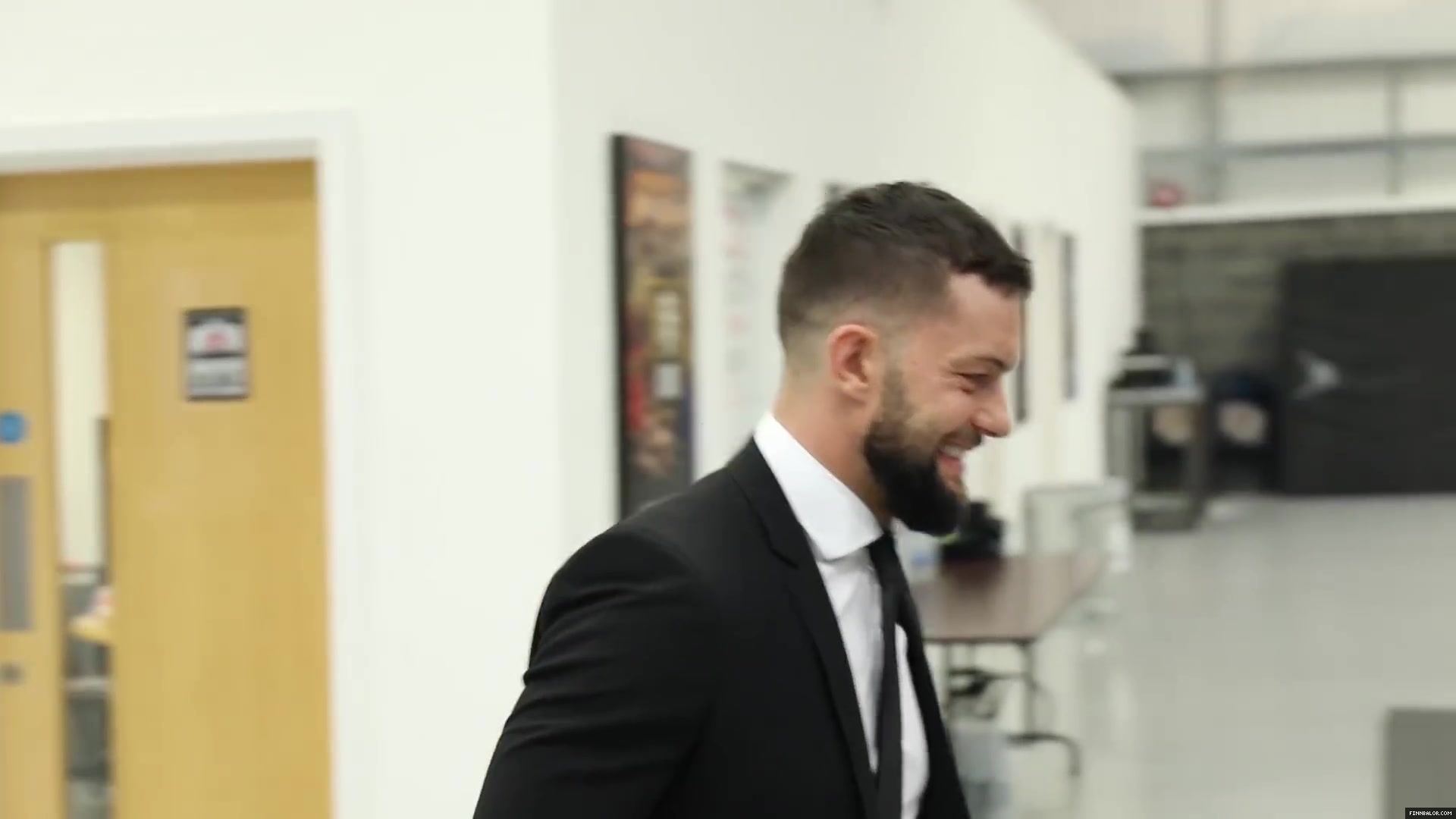 WWE_Superstar_FINN_BALOR_joins_MOUSTACHE_MOUNTAIN_at_the_opening_of_the_NXT_UK_PC_017.jpg
