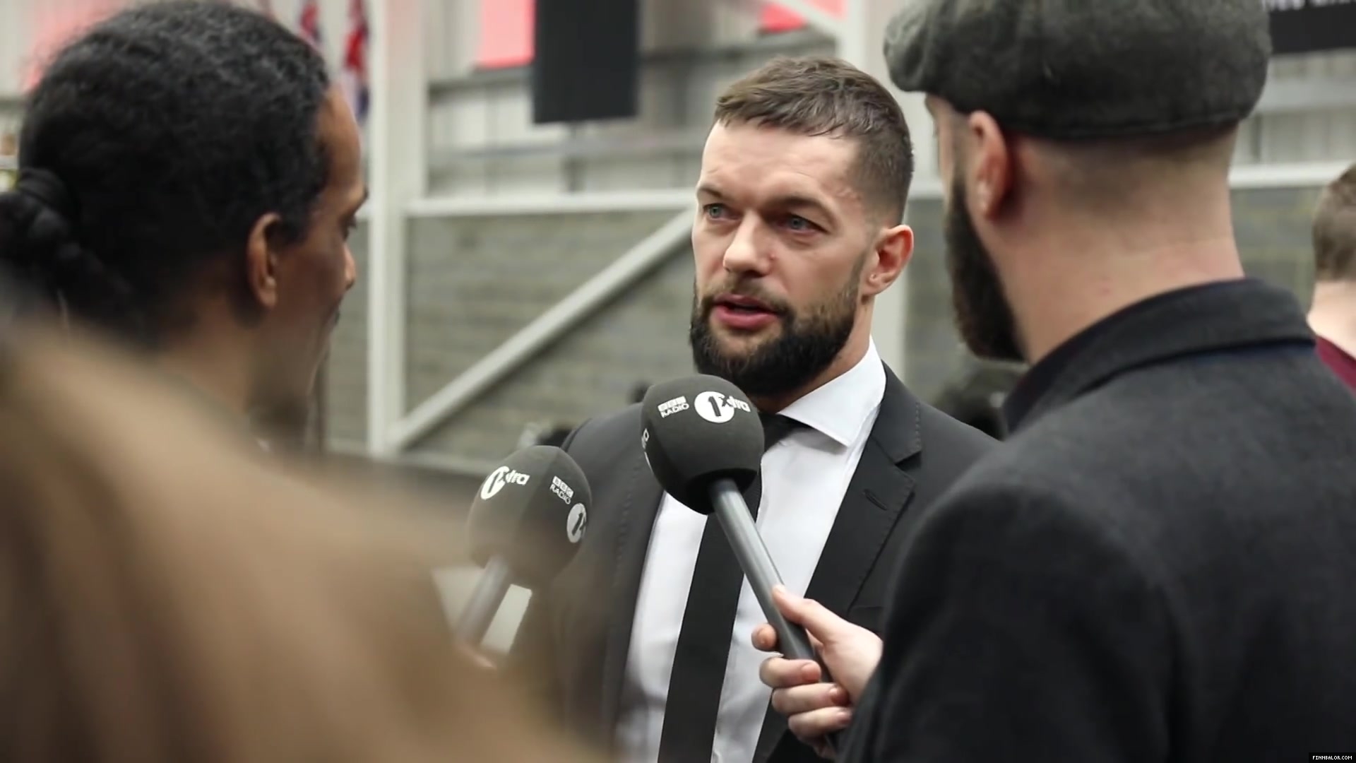 WWE_Superstar_FINN_BALOR_joins_MOUSTACHE_MOUNTAIN_at_the_opening_of_the_NXT_UK_PC_024.jpg