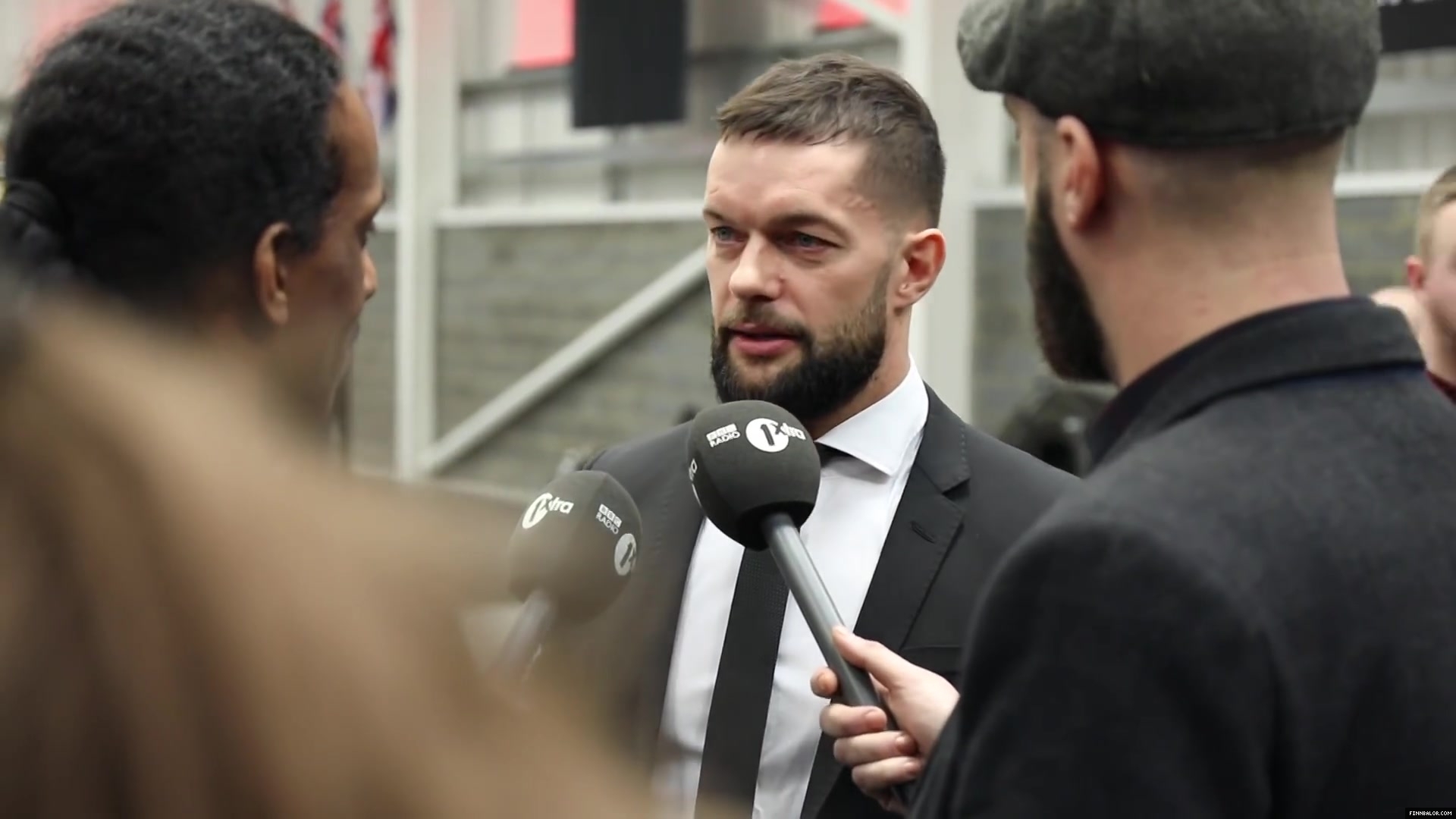 WWE_Superstar_FINN_BALOR_joins_MOUSTACHE_MOUNTAIN_at_the_opening_of_the_NXT_UK_PC_026.jpg