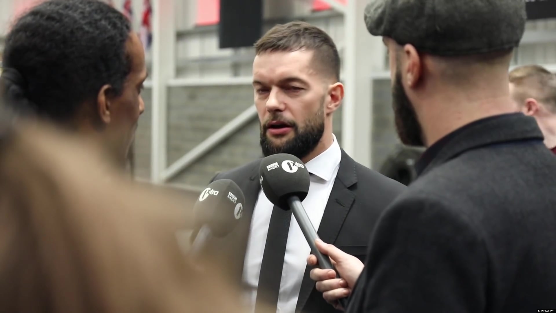 WWE_Superstar_FINN_BALOR_joins_MOUSTACHE_MOUNTAIN_at_the_opening_of_the_NXT_UK_PC_027.jpg