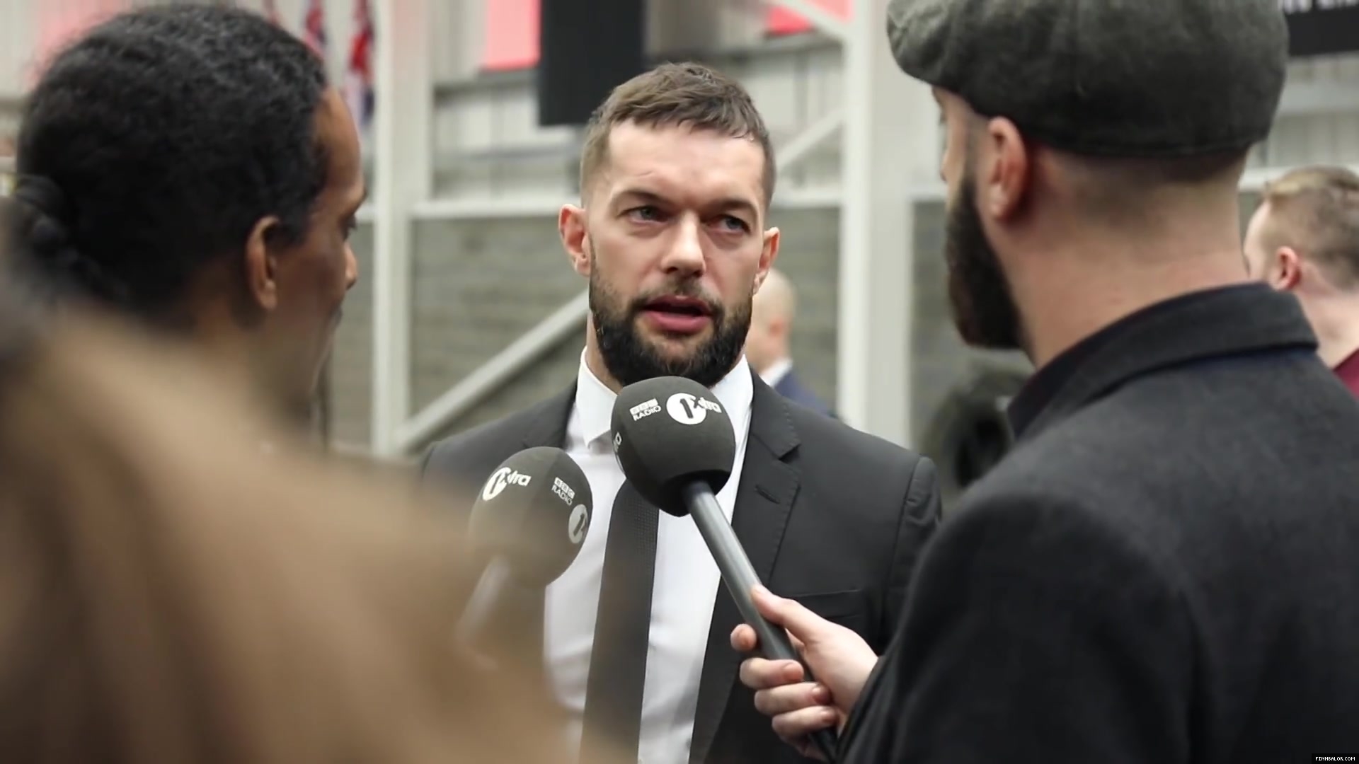 WWE_Superstar_FINN_BALOR_joins_MOUSTACHE_MOUNTAIN_at_the_opening_of_the_NXT_UK_PC_029.jpg