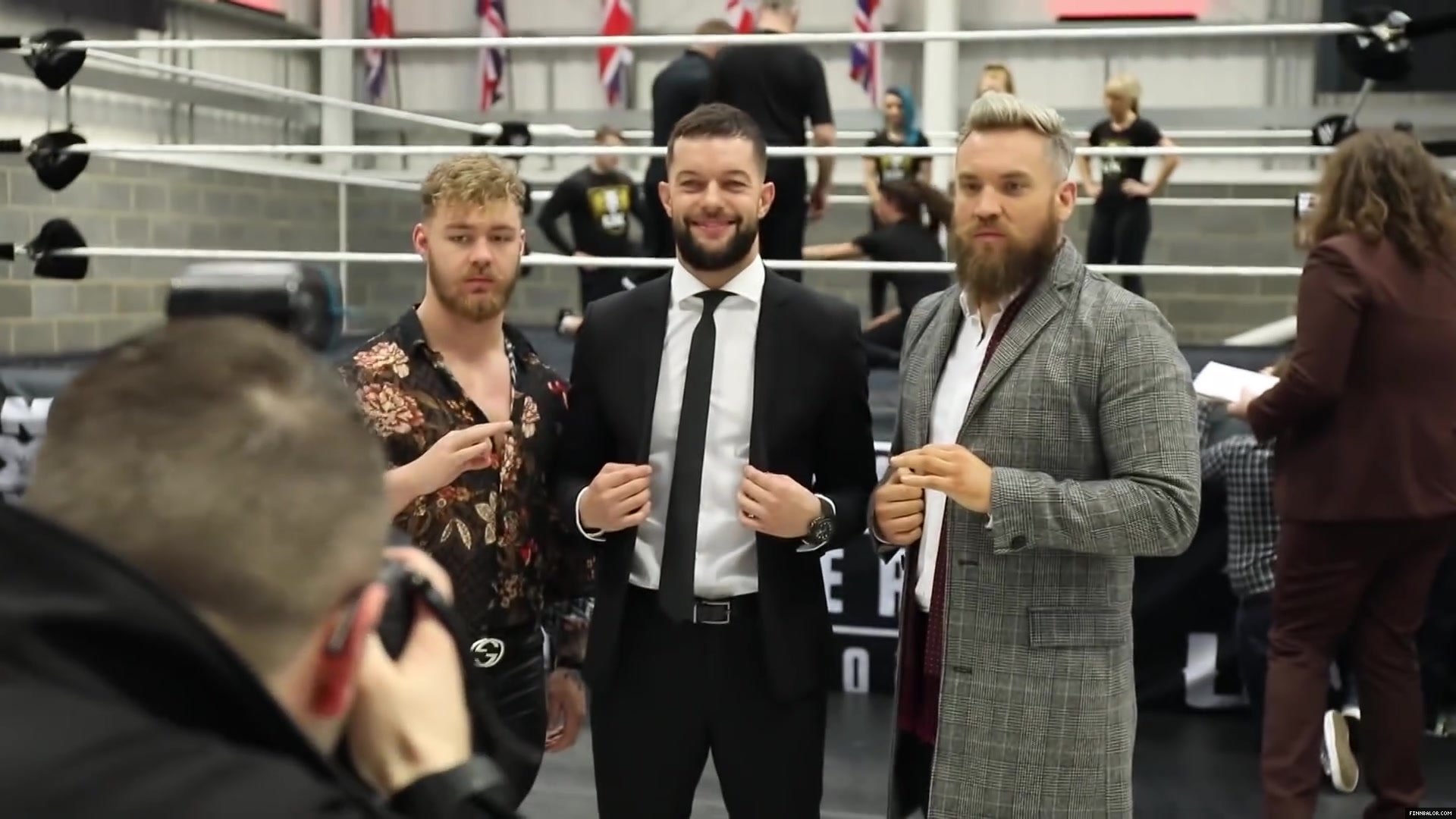WWE_Superstar_FINN_BALOR_joins_MOUSTACHE_MOUNTAIN_at_the_opening_of_the_NXT_UK_PC_036.jpg