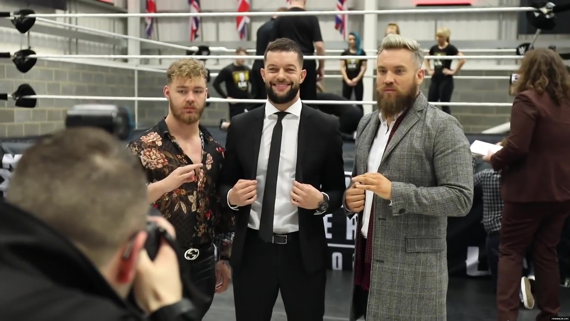 WWE_Superstar_FINN_BALOR_joins_MOUSTACHE_MOUNTAIN_at_the_opening_of_the_NXT_UK_PC_037.jpg