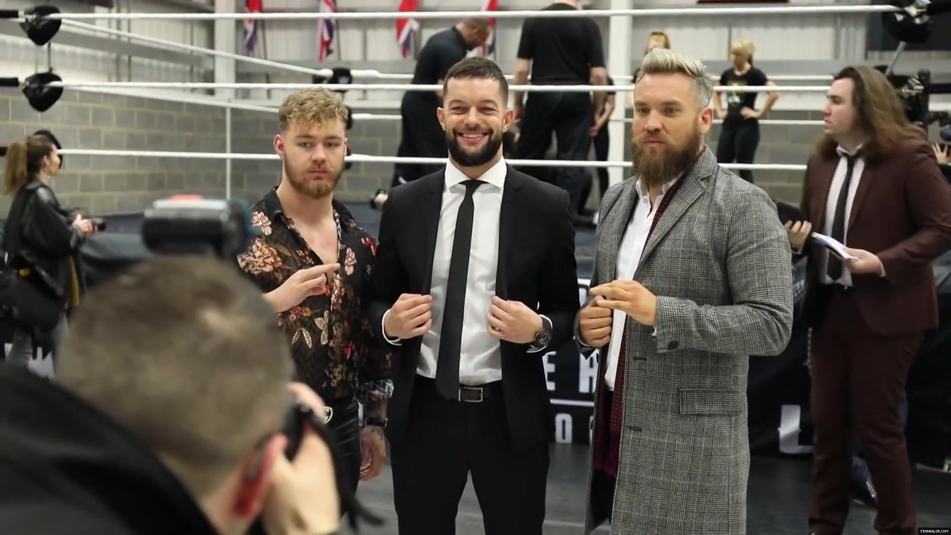 WWE_Superstar_FINN_BALOR_joins_MOUSTACHE_MOUNTAIN_at_the_opening_of_the_NXT_UK_PC_041.jpg