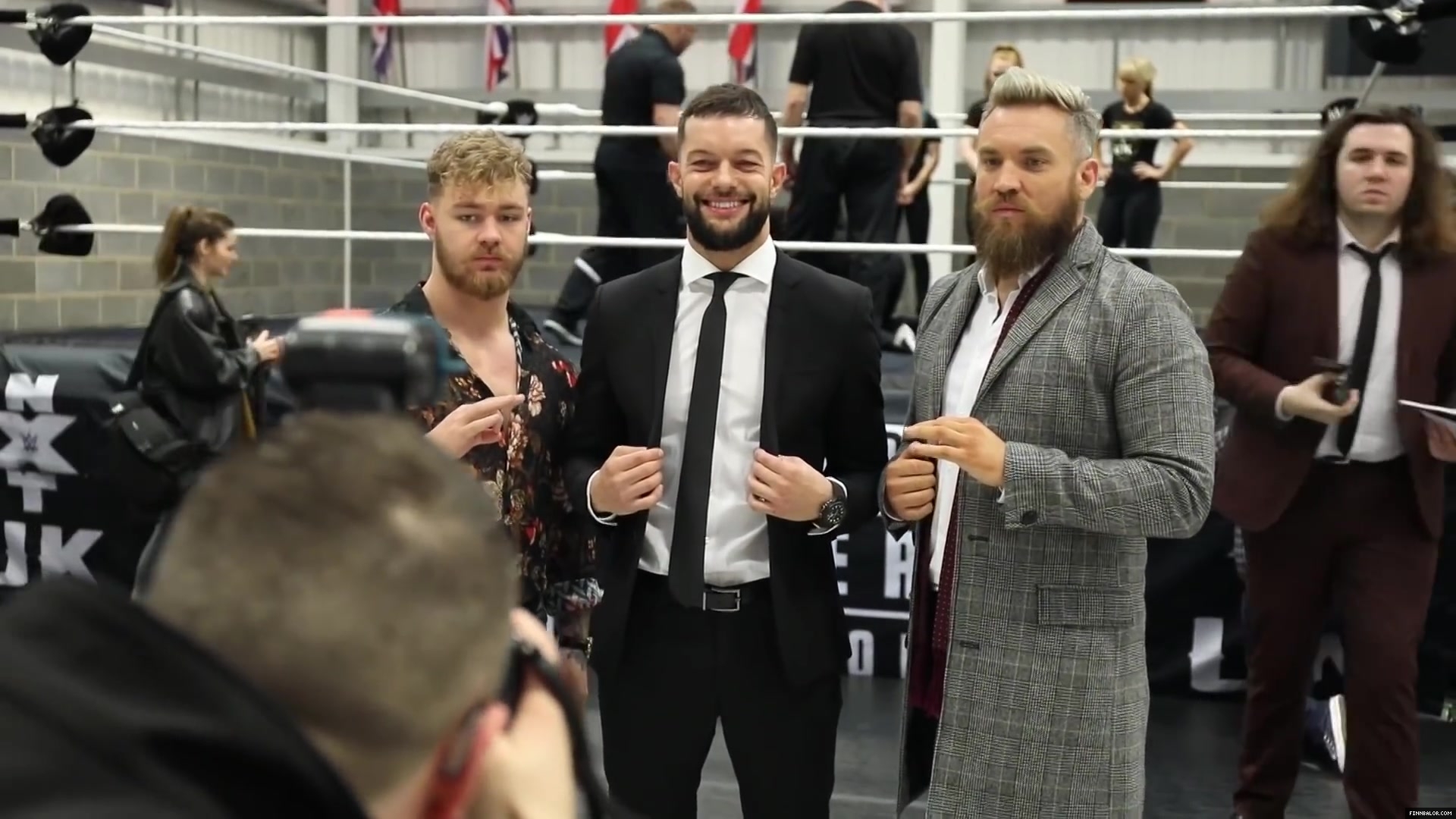 WWE_Superstar_FINN_BALOR_joins_MOUSTACHE_MOUNTAIN_at_the_opening_of_the_NXT_UK_PC_043.jpg