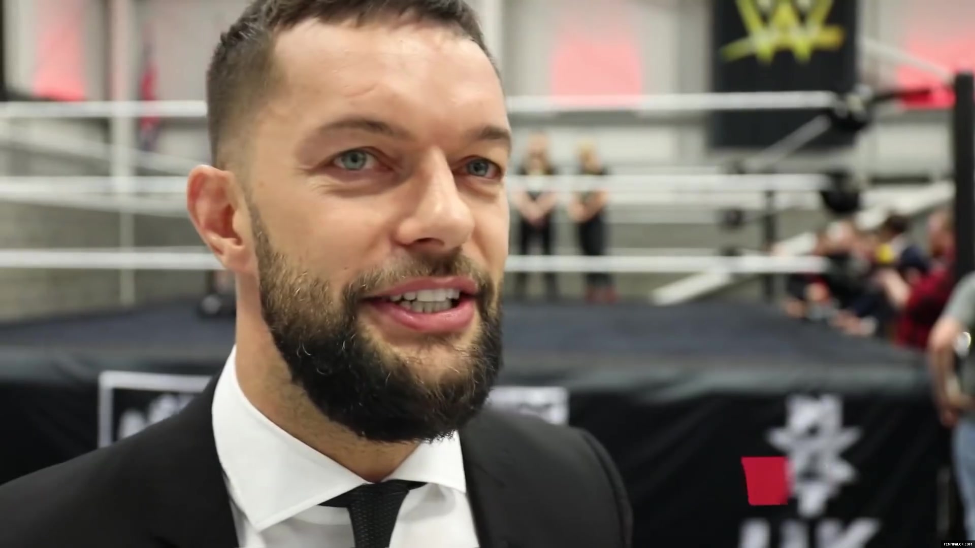 WWE_Superstar_FINN_BALOR_joins_MOUSTACHE_MOUNTAIN_at_the_opening_of_the_NXT_UK_PC_044.jpg