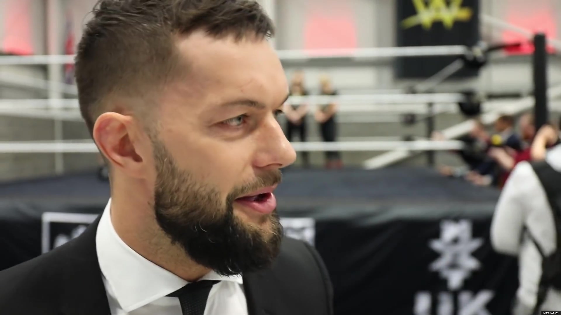 WWE_Superstar_FINN_BALOR_joins_MOUSTACHE_MOUNTAIN_at_the_opening_of_the_NXT_UK_PC_058.jpg