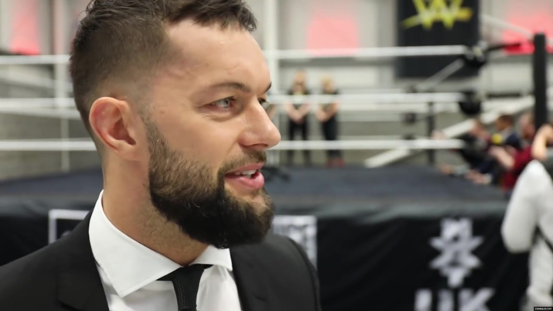 WWE_Superstar_FINN_BALOR_joins_MOUSTACHE_MOUNTAIN_at_the_opening_of_the_NXT_UK_PC_059.jpg