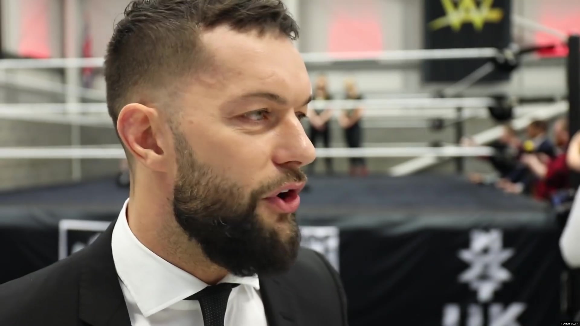 WWE_Superstar_FINN_BALOR_joins_MOUSTACHE_MOUNTAIN_at_the_opening_of_the_NXT_UK_PC_060.jpg