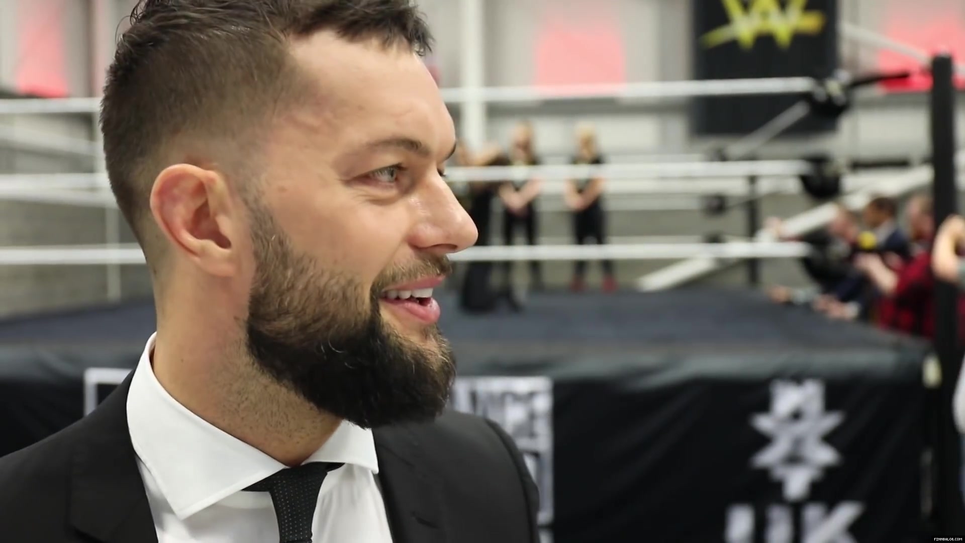 WWE_Superstar_FINN_BALOR_joins_MOUSTACHE_MOUNTAIN_at_the_opening_of_the_NXT_UK_PC_073.jpg