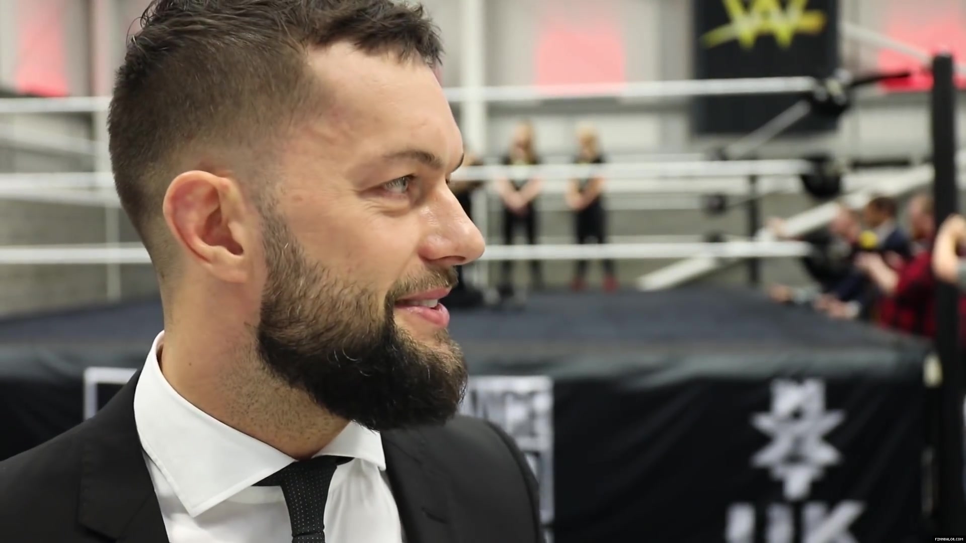 WWE_Superstar_FINN_BALOR_joins_MOUSTACHE_MOUNTAIN_at_the_opening_of_the_NXT_UK_PC_075.jpg