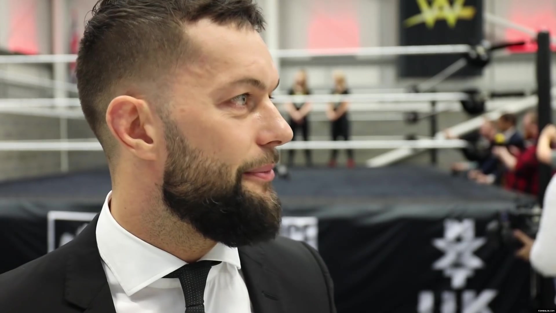 WWE_Superstar_FINN_BALOR_joins_MOUSTACHE_MOUNTAIN_at_the_opening_of_the_NXT_UK_PC_077.jpg