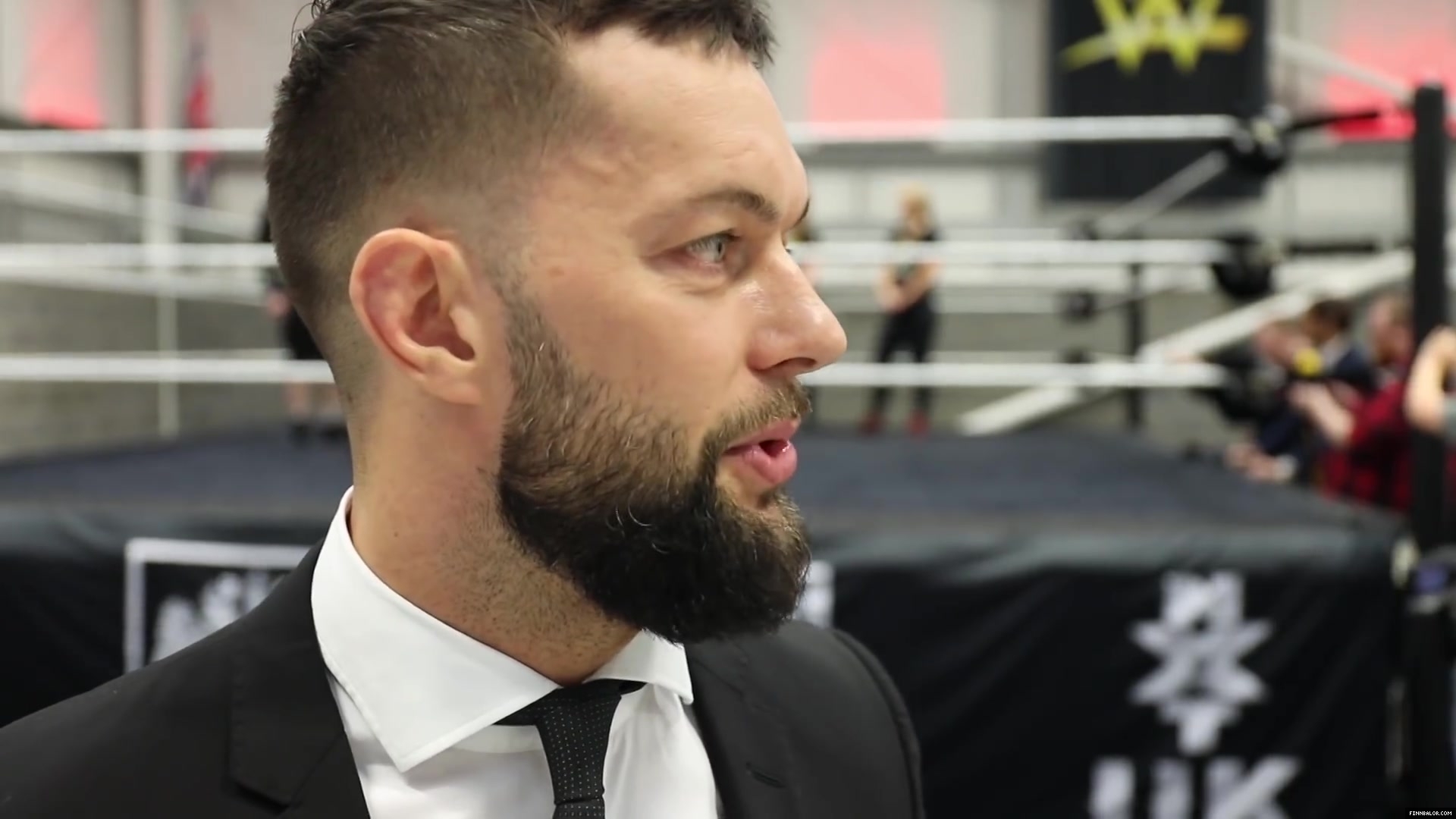 WWE_Superstar_FINN_BALOR_joins_MOUSTACHE_MOUNTAIN_at_the_opening_of_the_NXT_UK_PC_080.jpg