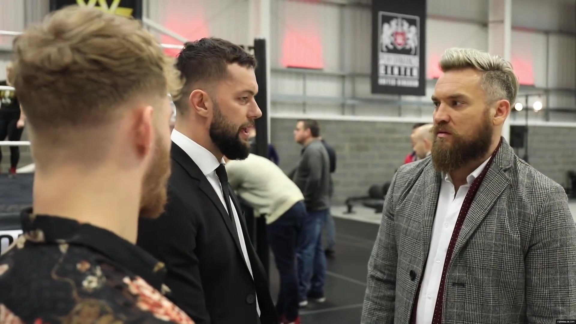 WWE_Superstar_FINN_BALOR_joins_MOUSTACHE_MOUNTAIN_at_the_opening_of_the_NXT_UK_PC_099.jpg