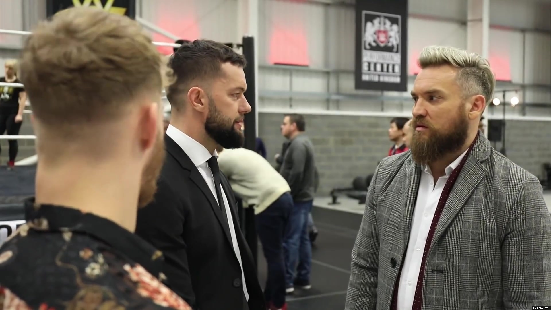 WWE_Superstar_FINN_BALOR_joins_MOUSTACHE_MOUNTAIN_at_the_opening_of_the_NXT_UK_PC_100.jpg