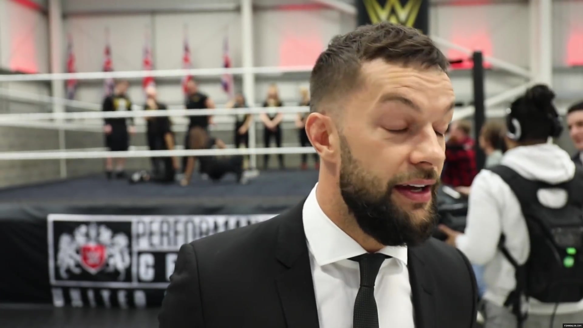 WWE_Superstar_FINN_BALOR_joins_MOUSTACHE_MOUNTAIN_at_the_opening_of_the_NXT_UK_PC_121.jpg