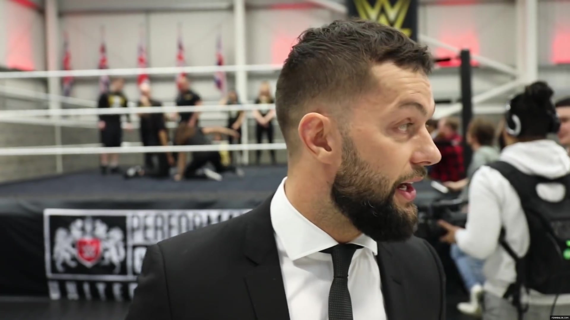 WWE_Superstar_FINN_BALOR_joins_MOUSTACHE_MOUNTAIN_at_the_opening_of_the_NXT_UK_PC_122.jpg