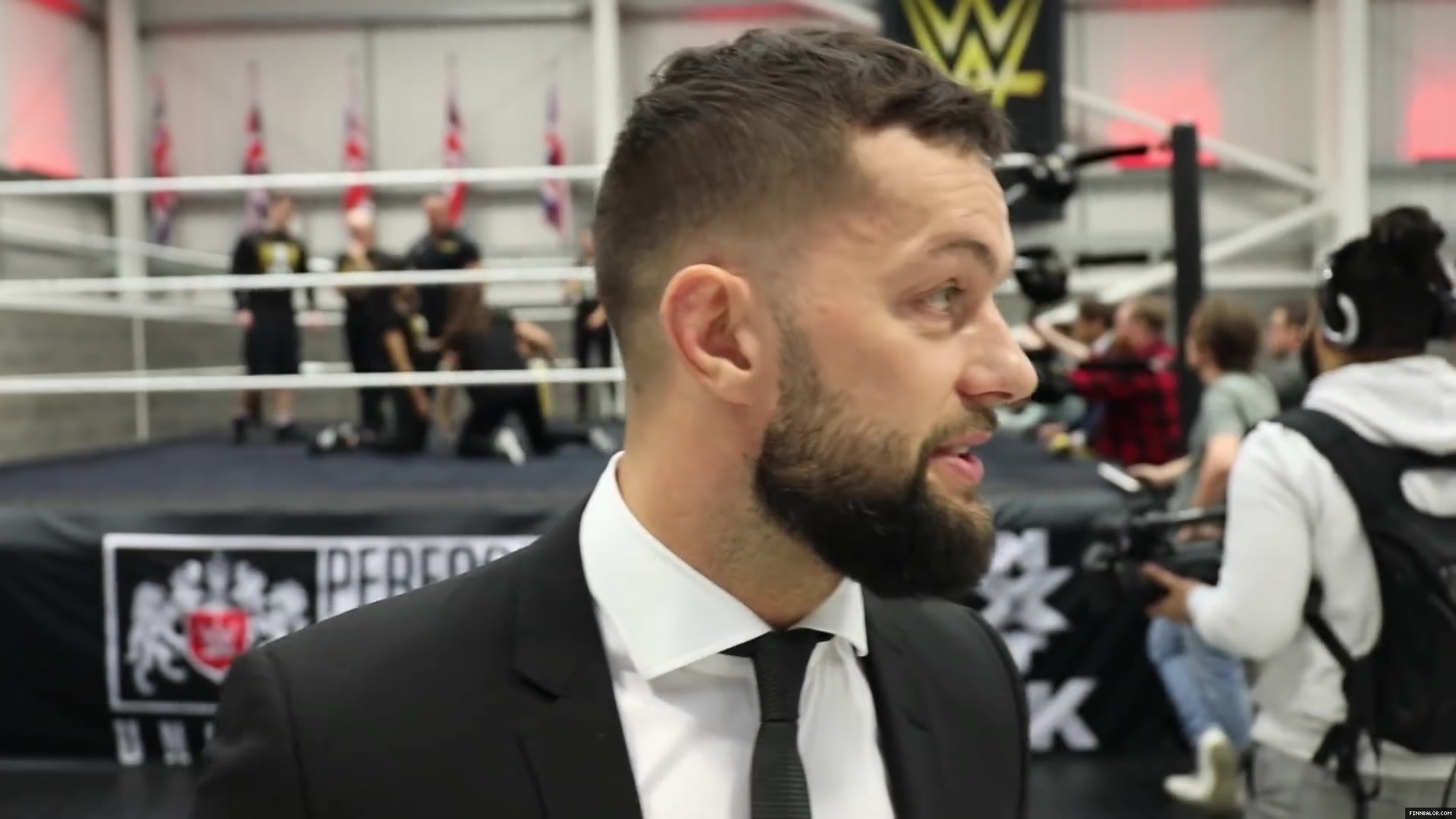 WWE_Superstar_FINN_BALOR_joins_MOUSTACHE_MOUNTAIN_at_the_opening_of_the_NXT_UK_PC_123.jpg