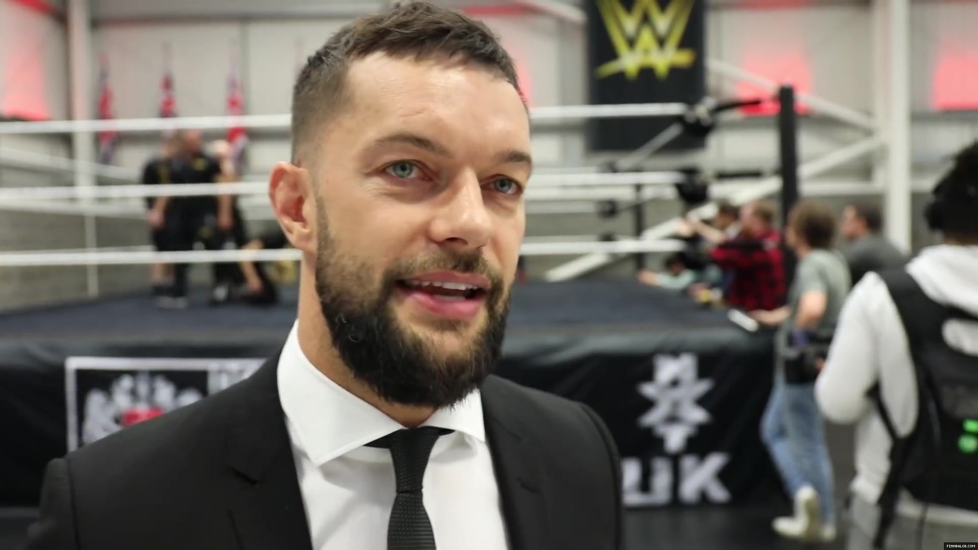 WWE_Superstar_FINN_BALOR_joins_MOUSTACHE_MOUNTAIN_at_the_opening_of_the_NXT_UK_PC_127.jpg