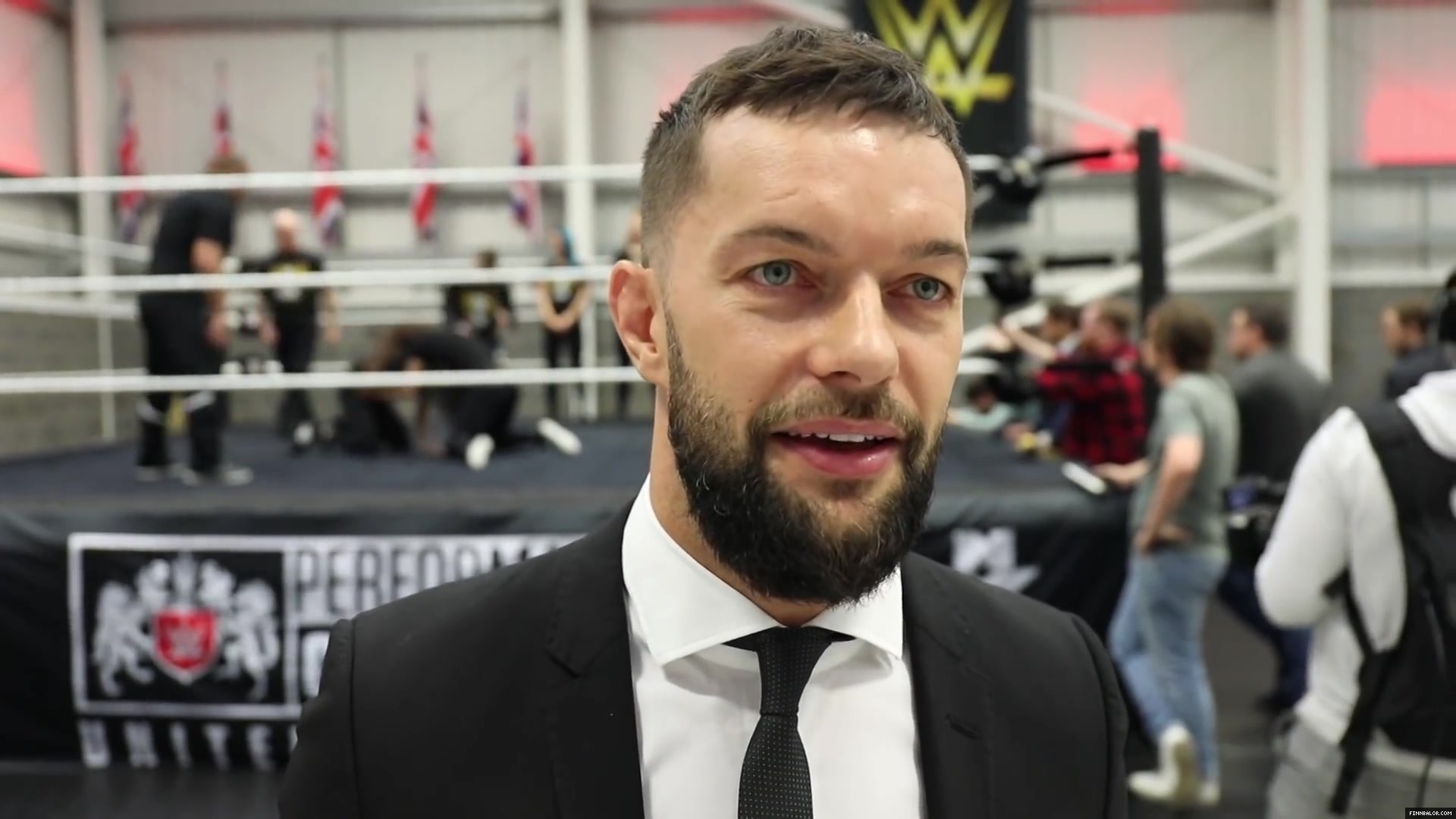 WWE_Superstar_FINN_BALOR_joins_MOUSTACHE_MOUNTAIN_at_the_opening_of_the_NXT_UK_PC_135.jpg