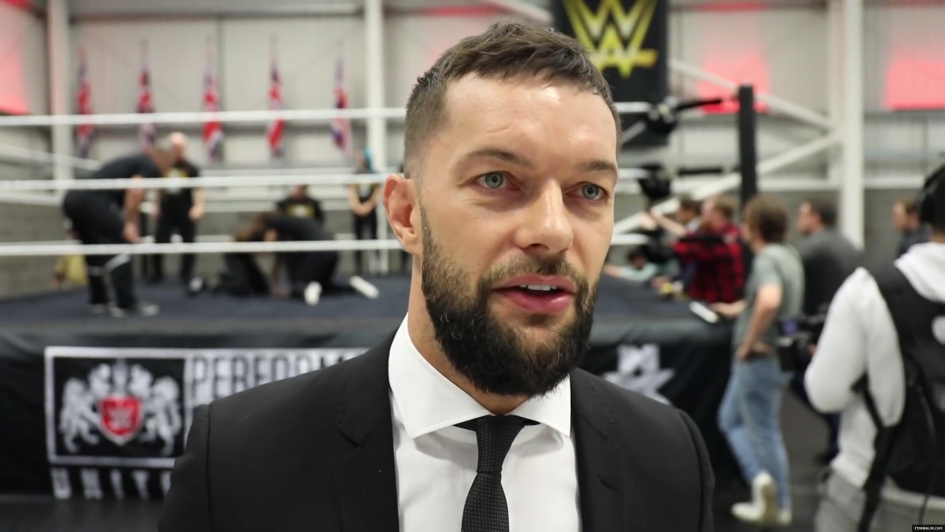 WWE_Superstar_FINN_BALOR_joins_MOUSTACHE_MOUNTAIN_at_the_opening_of_the_NXT_UK_PC_137.jpg