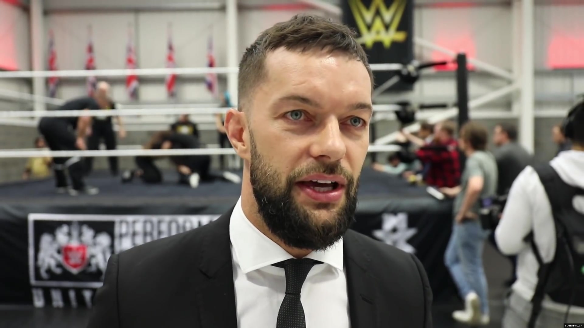 WWE_Superstar_FINN_BALOR_joins_MOUSTACHE_MOUNTAIN_at_the_opening_of_the_NXT_UK_PC_138.jpg