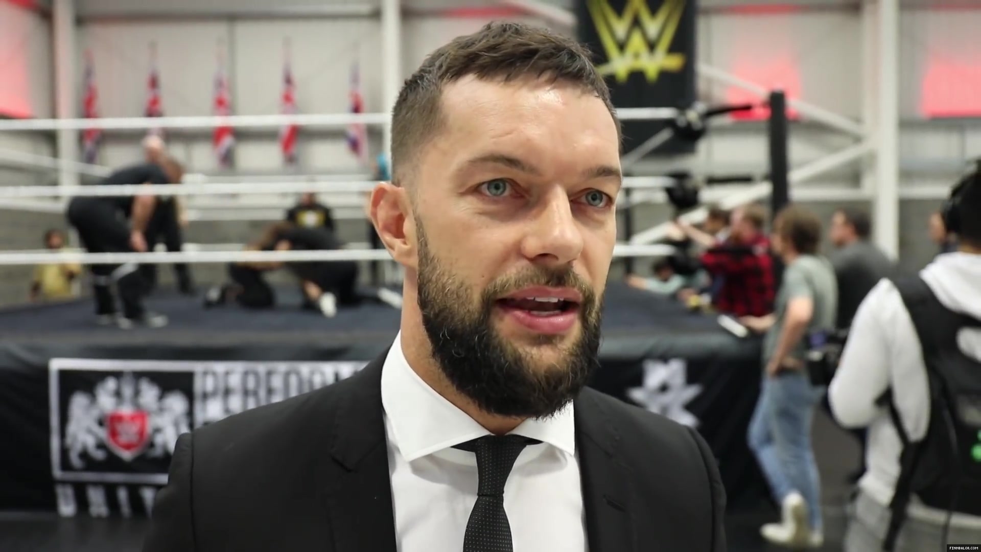 WWE_Superstar_FINN_BALOR_joins_MOUSTACHE_MOUNTAIN_at_the_opening_of_the_NXT_UK_PC_139.jpg