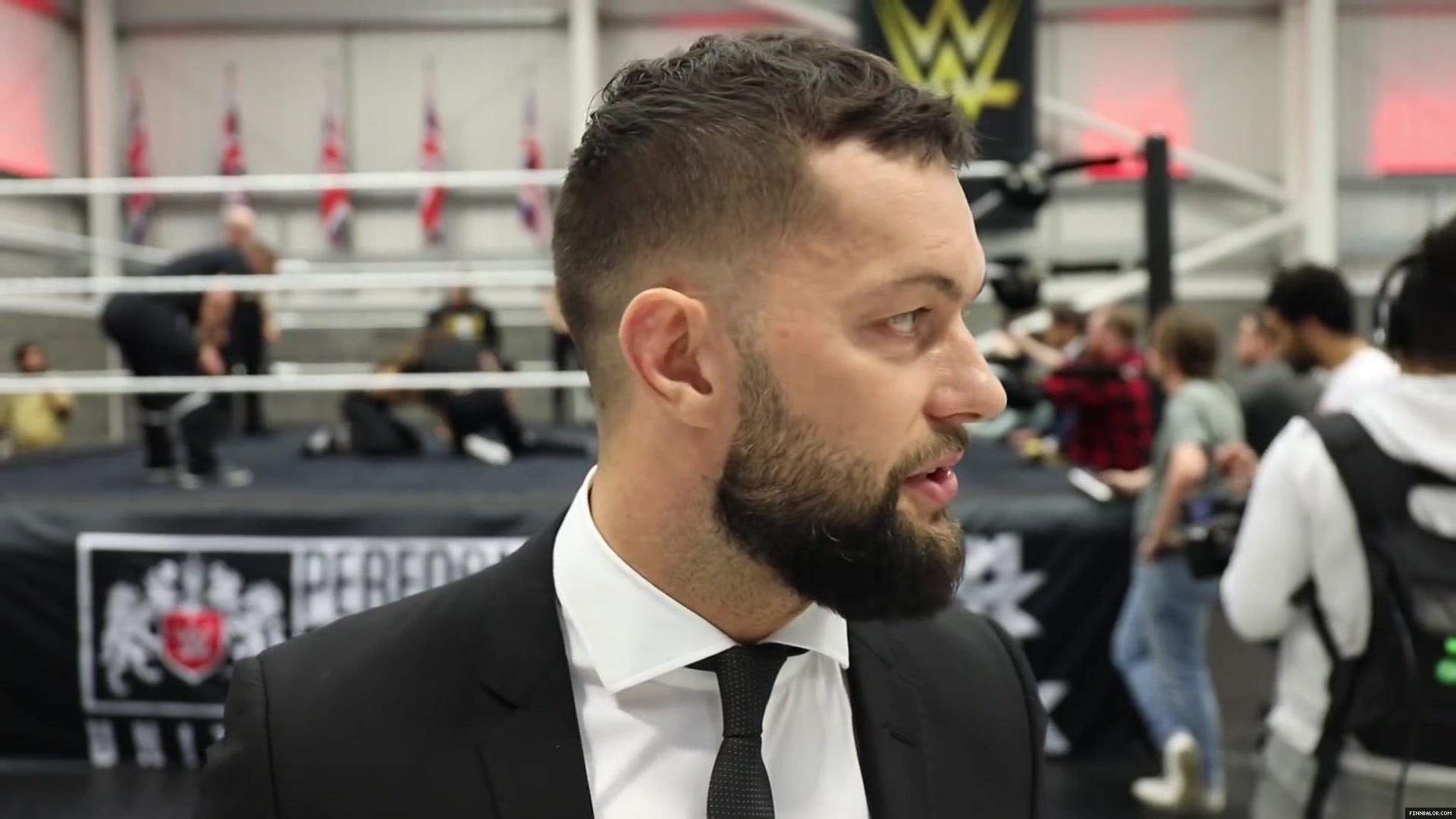 WWE_Superstar_FINN_BALOR_joins_MOUSTACHE_MOUNTAIN_at_the_opening_of_the_NXT_UK_PC_141.jpg