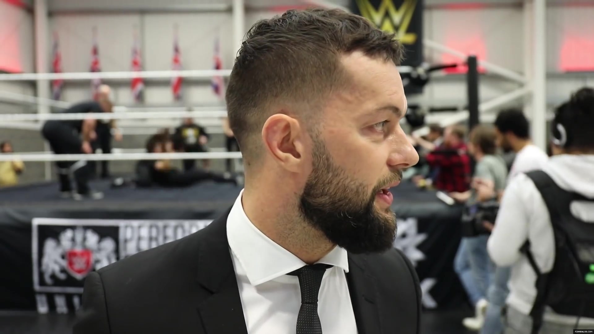 WWE_Superstar_FINN_BALOR_joins_MOUSTACHE_MOUNTAIN_at_the_opening_of_the_NXT_UK_PC_142.jpg