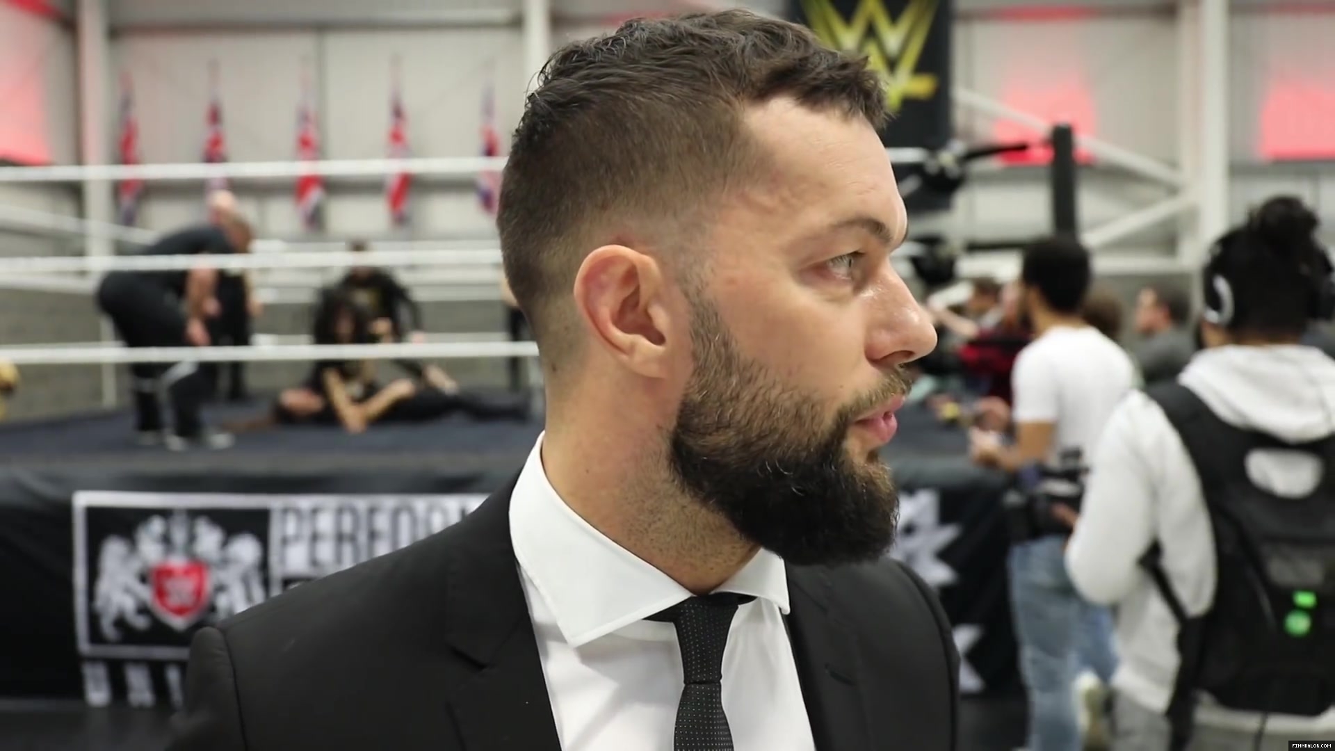 WWE_Superstar_FINN_BALOR_joins_MOUSTACHE_MOUNTAIN_at_the_opening_of_the_NXT_UK_PC_144.jpg