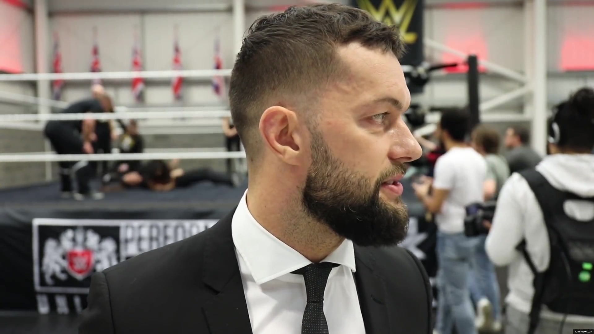 WWE_Superstar_FINN_BALOR_joins_MOUSTACHE_MOUNTAIN_at_the_opening_of_the_NXT_UK_PC_145.jpg