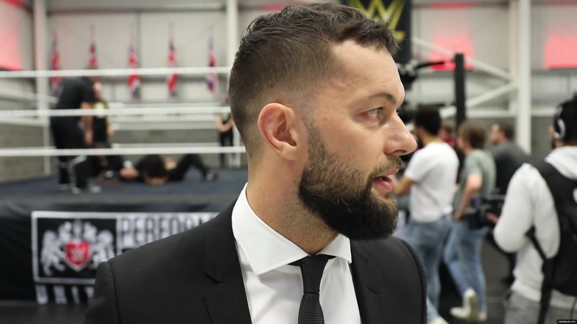 WWE_Superstar_FINN_BALOR_joins_MOUSTACHE_MOUNTAIN_at_the_opening_of_the_NXT_UK_PC_146.jpg