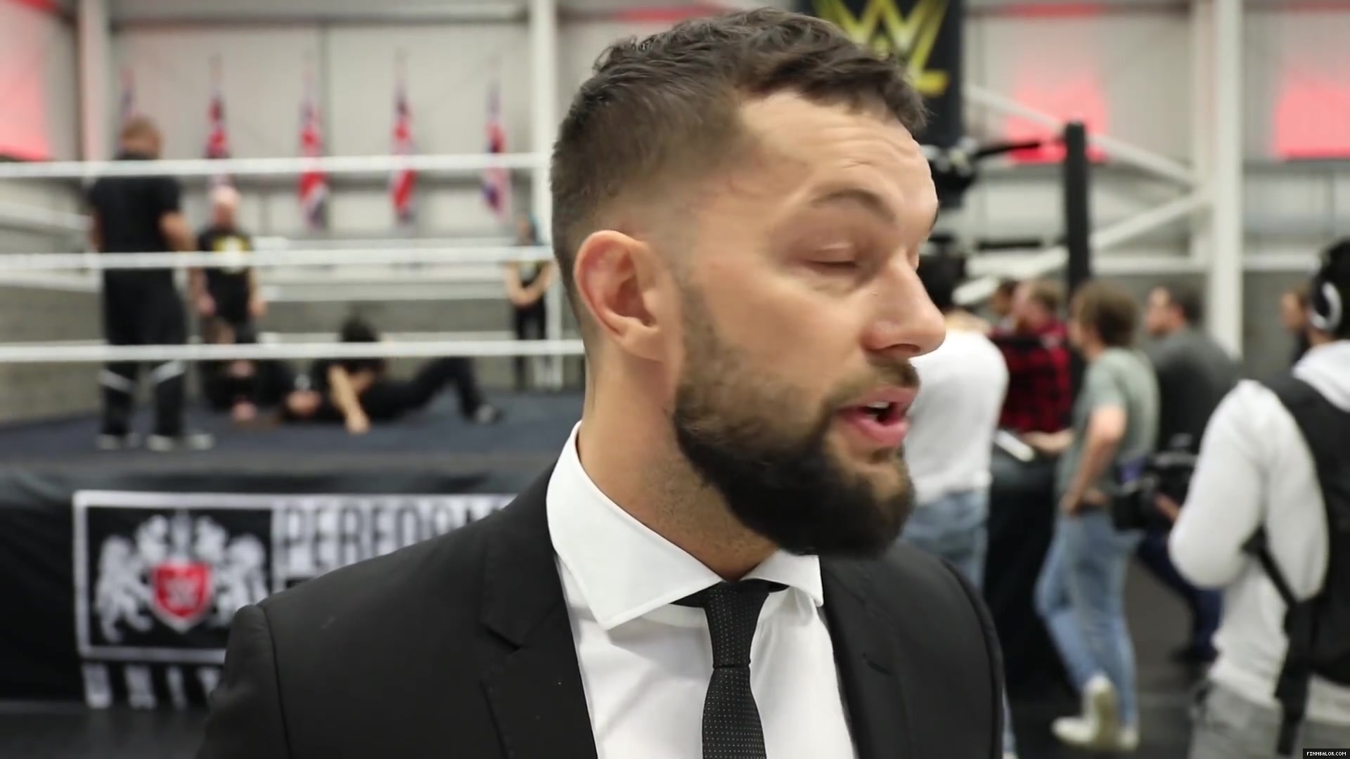 WWE_Superstar_FINN_BALOR_joins_MOUSTACHE_MOUNTAIN_at_the_opening_of_the_NXT_UK_PC_149.jpg