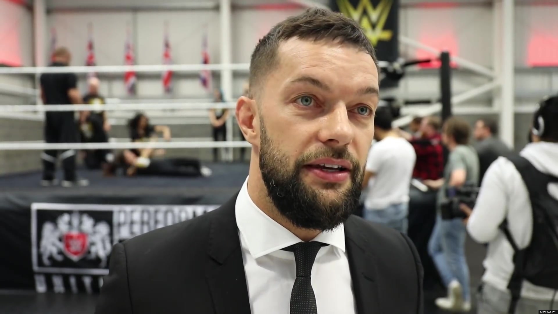 WWE_Superstar_FINN_BALOR_joins_MOUSTACHE_MOUNTAIN_at_the_opening_of_the_NXT_UK_PC_151.jpg