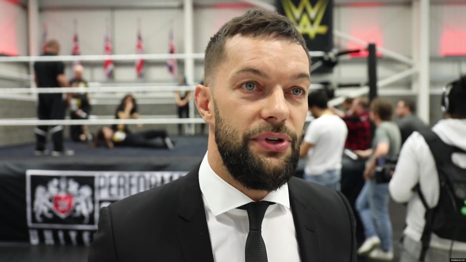 WWE_Superstar_FINN_BALOR_joins_MOUSTACHE_MOUNTAIN_at_the_opening_of_the_NXT_UK_PC_152.jpg