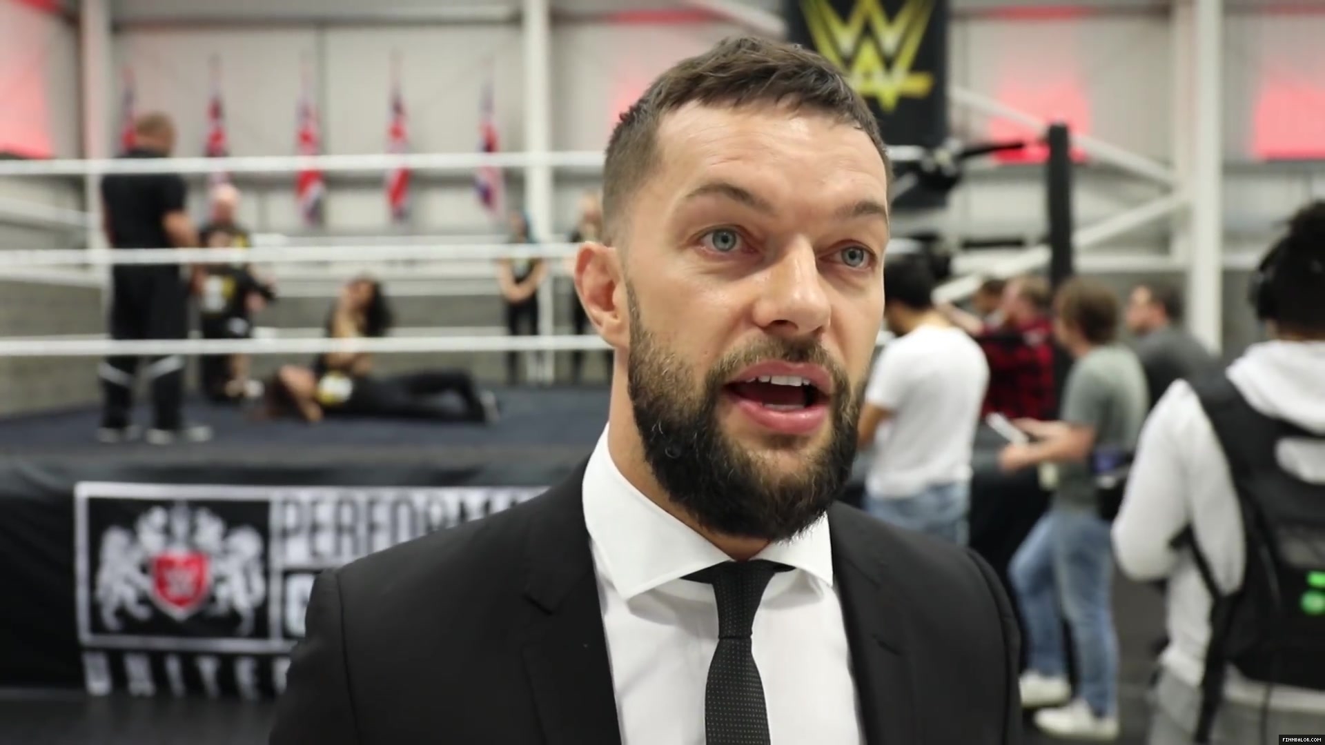 WWE_Superstar_FINN_BALOR_joins_MOUSTACHE_MOUNTAIN_at_the_opening_of_the_NXT_UK_PC_153.jpg